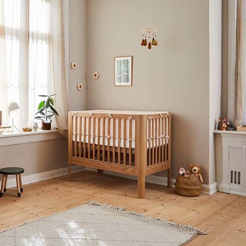 Babybett in massiver Eiche umbaubar